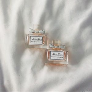 Two mini Miss Dior Absolutely Blooming perfumes